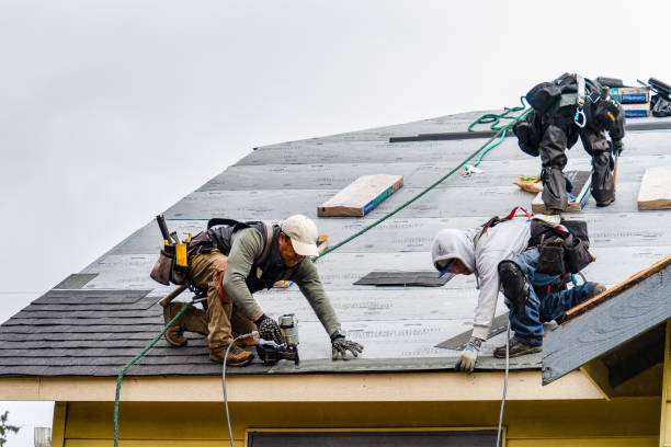 Professional Gutter Installation technician working in Marshfield Hills, MA